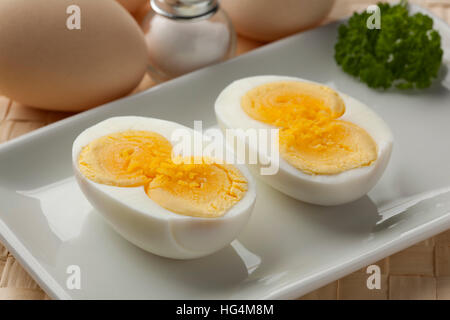 Cooked double yolk egg on a dish Stock Photo