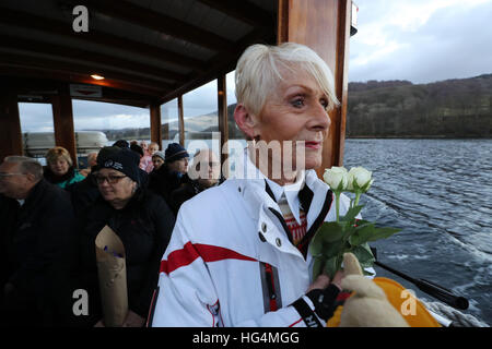 Gina Campbell, the daughter of world land and water speed record holder Donald Campbell, marks the 50th anniversary of the fatal crash there of his jet-powered Bluebird boat at Lake Coniston. Stock Photo