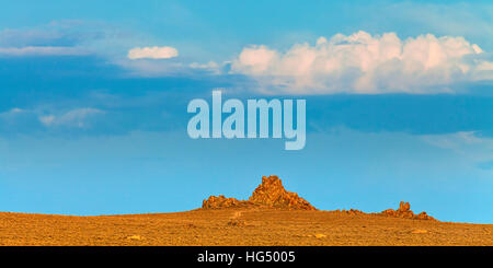 Nevada landscape at sunset near Lovelock, NV. Tufa rock formations under blue sky. Stock Photo