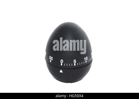 Timer in the form of black eggs on a white background Stock Photo