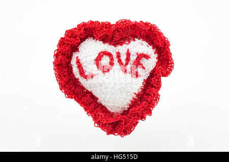 handmade heart knitted made from yarn and with word love Stock Photo