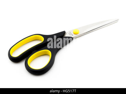 Black Scissors with yellow elements isolated on white background Stock Photo