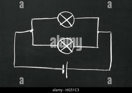 The electrical diagram drawn on a blackboard with chalk Stock Photo