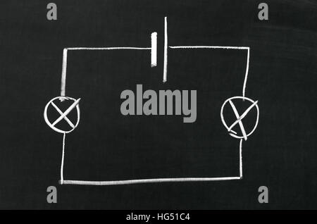 The electrical diagram drawn on a blackboard with chalk Stock Photo