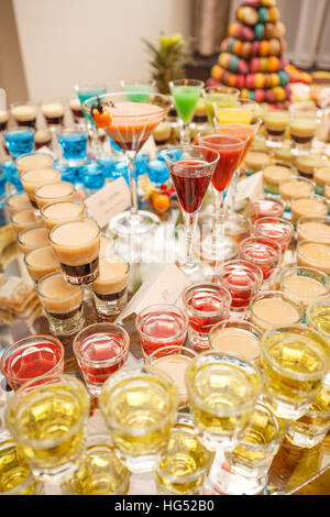 Variation of hard alcoholic shots served on bar counter Stock Photo