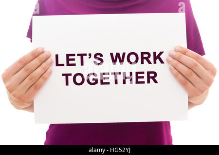 Girl holding white paper sheet with text Let's work together Stock Photo