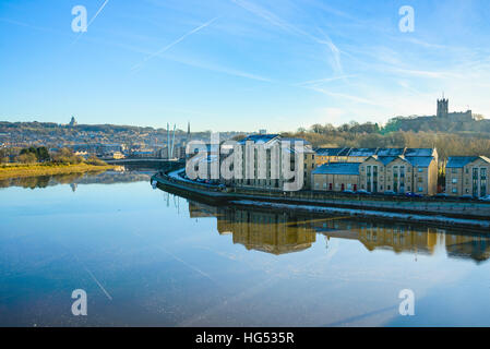 River Lune and St George's Quay Lancaster Lancashire England. Ashton Memorial on left skyline, Priory Church on right Stock Photo