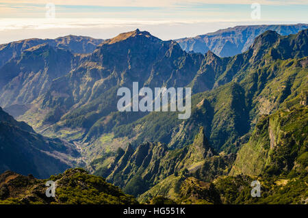 View from Pico Ruivo Madeira’s highest summit with Curral das Freiras far below Stock Photo