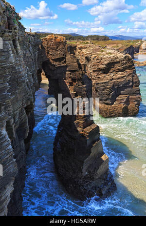 Natural rock arches on Cathedrals beach  in low tide (Cantabric coast, Lugo (Galicia), Spain). Stock Photo