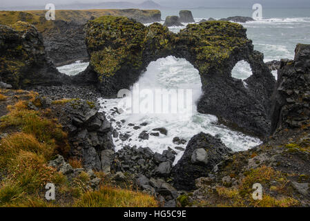 Gatklettur basalt rock arch on the Snaefellsness Peninsula, Iceland, Polar Regions Stock Photo