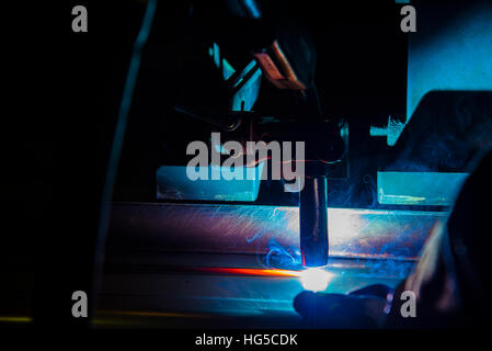 Welding robots movement in a car factory welding robot welding splashes brews argon Stock Photo