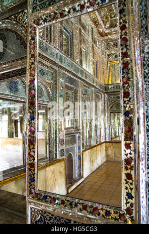 Reflections in mirrored reception hall, Khan-e Zinat al-Molk, Qavam al-Molk family's private quarters, Shiraz, Iran, Middle East Stock Photo