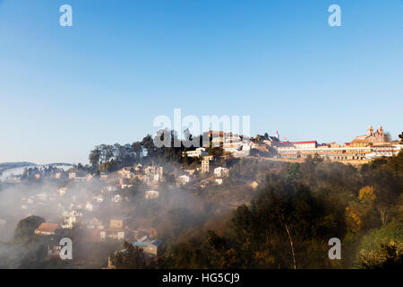 Fianarantsoa, early morning mist on the Haute Ville old town, central area Stock Photo