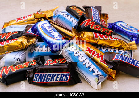 Paphos, Cyprus - November 18, 2016 Heap of Mars, Snickers, Milky Way, Bounty and Twix chocolate candies. All candies manufactured by Mars Incorporated Stock Photo