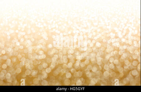 Gold glitter.Gold sparkle. Glitter background. Holiday blurred background. Stock Photo
