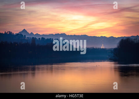 Turin amazing sunset with Mole Antonelliana, river Po and Monviso Stock Photo