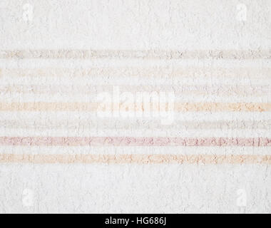 Pastel colors painted lines on plaster Stock Photo