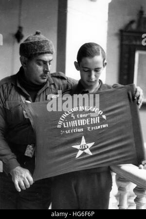 The Nazi propaganda picture shows Falange members who belong to Francos troops after the occupation of Malaga. They are holding a flag of the battalion Mexico of the international brigades in Malaga, Spain, February 1937. Fotoarchiv für Zeitgeschichtee - NO WIRE SERVICE - | usage worldwide Stock Photo