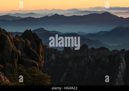 Huangshan, Huangshan, China. 5th Jan, 2017. Huangshan, CHINA-January 5 2017: (EDITORIAL USE ONLY. CHINA OUT).Sunrise at Mount Huangshan in Huangshan City, east China's Anhui Province, January 5th, 2017. Mount Huangshan, also known as Yellow Mountain, is well known for its scenery, peculiarly-shaped granite peaks, Huangshan pine trees, hot springs, winter snow, and views of the clouds from above. Huangshan is a frequent subject of traditional Chinese paintings and literature, as well as modern photography. It is a UNESCO World Heritage Site, and one of China's major tourist destinations. (C Stock Photo