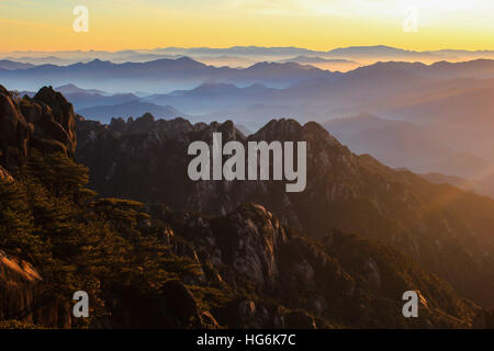 Huangshan, Huangshan, China. 5th Jan, 2017. Huangshan, CHINA-January 5 2017: (EDITORIAL USE ONLY. CHINA OUT).Sunrise at Mount Huangshan in Huangshan City, east China's Anhui Province, January 5th, 2017. Mount Huangshan, also known as Yellow Mountain, is well known for its scenery, peculiarly-shaped granite peaks, Huangshan pine trees, hot springs, winter snow, and views of the clouds from above. Huangshan is a frequent subject of traditional Chinese paintings and literature, as well as modern photography. It is a UNESCO World Heritage Site, and one of China's major tourist destinations. (C Stock Photo