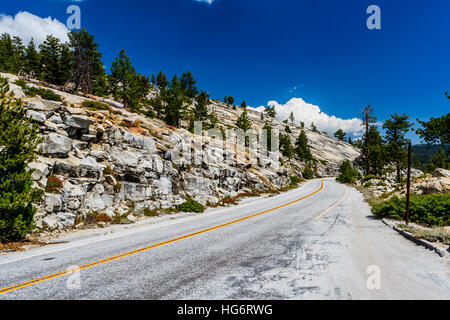 Tioga Pass is a mountain pass in the Sierra Nevada mountains. State Route 120 runs through it, and serves as the eastern entry point for Yosemite Nati Stock Photo