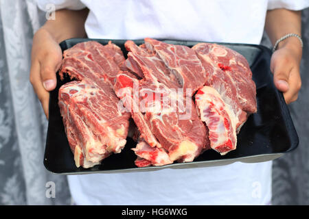 Raw Lamb loin chops in plastic tray Stock Photo