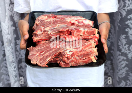 Raw Lamb loin chops on a plastic tray Stock Photo