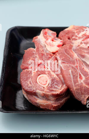 Raw Lamb loin chops in plastic tray Stock Photo