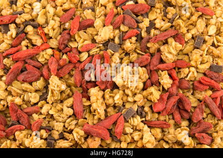Close up of chocolate muesli with pieces of chocolate in a bowl on white  isolated background Stock Photo - Alamy