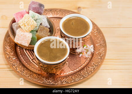 Coffee and Turkish delight in a copper kitchen utensils Stock Photo