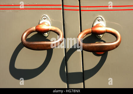 Detail of door handles on retro/ vintage/ old/ antique car. Stock Photo