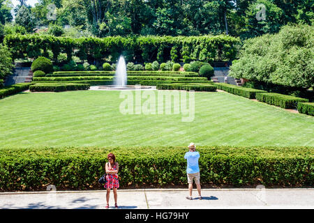 New York City,NY NYC Manhattan,Spanish Harlem,Central Park,urban,Conservatory Garden,formal garden,fountain,adult,adults,man men male,woman female wom Stock Photo