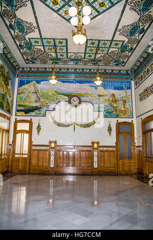 Interior of the North train station Estació del Nord Valencia, Spain. Old mosaic tile scene decoration. Stock Photo