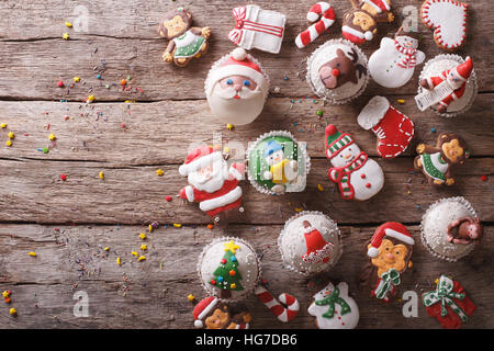 Background of Christmas sweets on a wooden table. horizontal view from above Stock Photo
