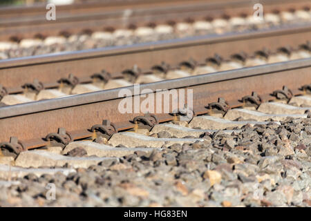 german rail road line lies on stones Stock Photo