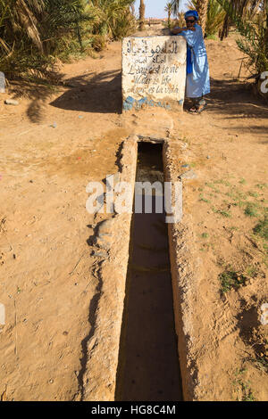 Simple and effective system of irrigation in the oasis of Merzouga, Morocco Stock Photo