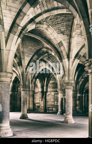 Image of arches in a Glasgow University building. Toned image, some noice. Stock Photo