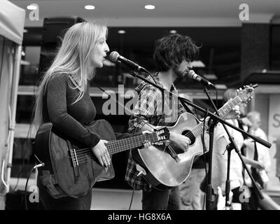 folk rock singer/guitarists on stage at the Tramlines Festival Fringe, the Moor, Sheffield 2014 Stock Photo