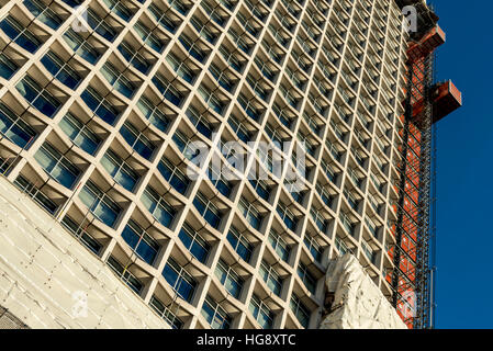 Looking up at London's iconic building Centre Point being refurbished. Stock Photo