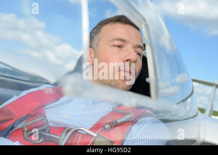 Man in glider Stock Photo