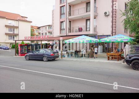 Nessebar, Bulgaria - JUNE 19, 2016: street New Nessebar emerging architecture and leisure travelers and locals people. Stock Photo