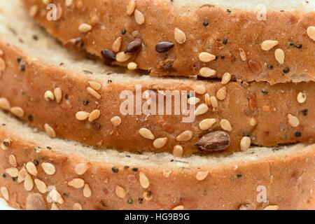 Slices of Warburtons Seeded Batch loaf five seed combination of linseed, millet, poppy, sunflower, and sesame. Stock Photo