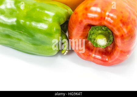 colored peppers over white background, Fresh vegetables sweet Peppers or Bell peppers Stock Photo