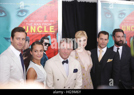 Armie Hammer, Alicia Vikander, Guy Ritchie, Elizabeth Debicki, Henry Cavill and Luca Cavalli arrive at The Man From U.N.C.L.E premiere at the Zigfield Theater in NYC. Stock Photo