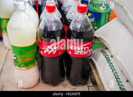 Zam zam Cola soft drink and mint Doogh yogurt-based beverage in shop in Iran Stock Photo