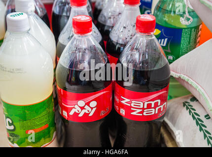 Zam zam Cola soft drink and mint Doogh yogurt-based beverage in shop in Iran Stock Photo