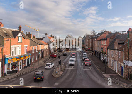 View from the top of Walmgate Bar, York, North Yorkshire, England - road junction, traffic, shops, homes and people are seen. Stock Photo