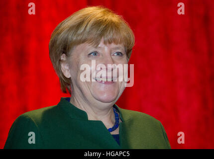 Trinwillershagen, Germany. 6th Jan, 2017. German Chancellor Angela Merkel (CDU) laughing at a New Year's reception of the Landrat of the Vorpommern-Ruegen district, in Trinwillershagen, Germany, 6 January 2017. Merkel has represented the Stralsund-Greifswald-Ruegen-Vorpommern constituency in the Bundestag since 1990. Photo: Stefan Sauer/dpa-Zentralbild/dpa/Alamy Live News Stock Photo