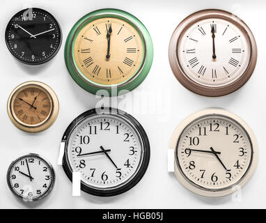 clocks, on white (details and color here is highly processed) Stock Photo