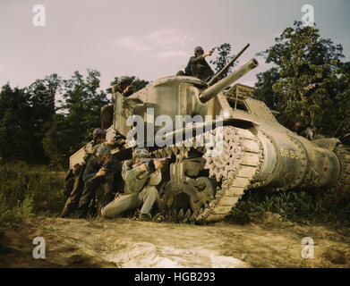 June 1942 - M3 tank and crew using small arms, Fort Knox, Kentucky. Stock Photo